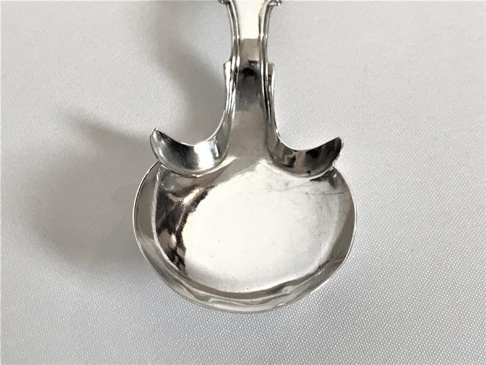 An unusual design Georgian silver caddy spoon View II
