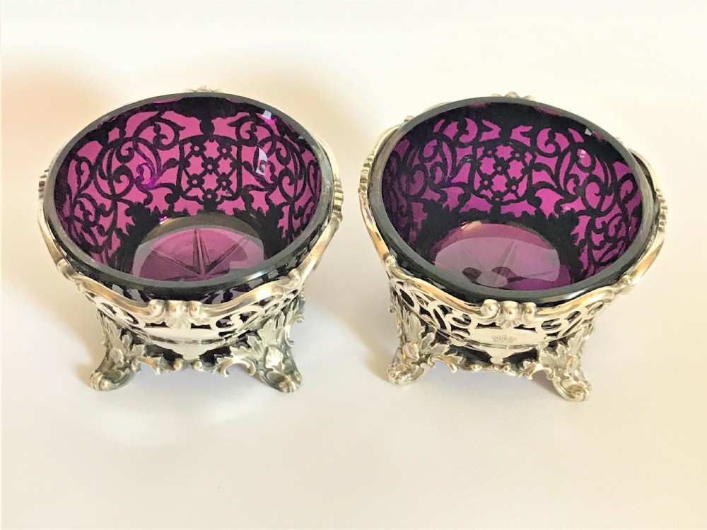 A magnificent pair of silver & amethyst glass condiment tubs View V