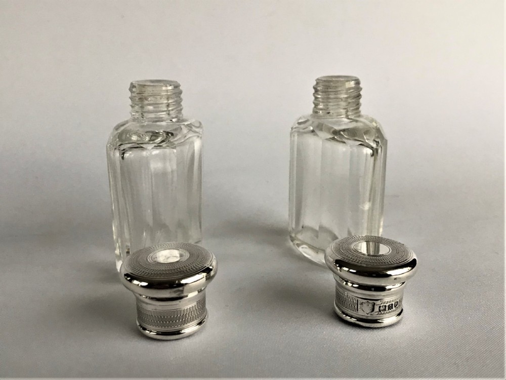 A delightful pair of silver mounted small toilet water bottles View IV
