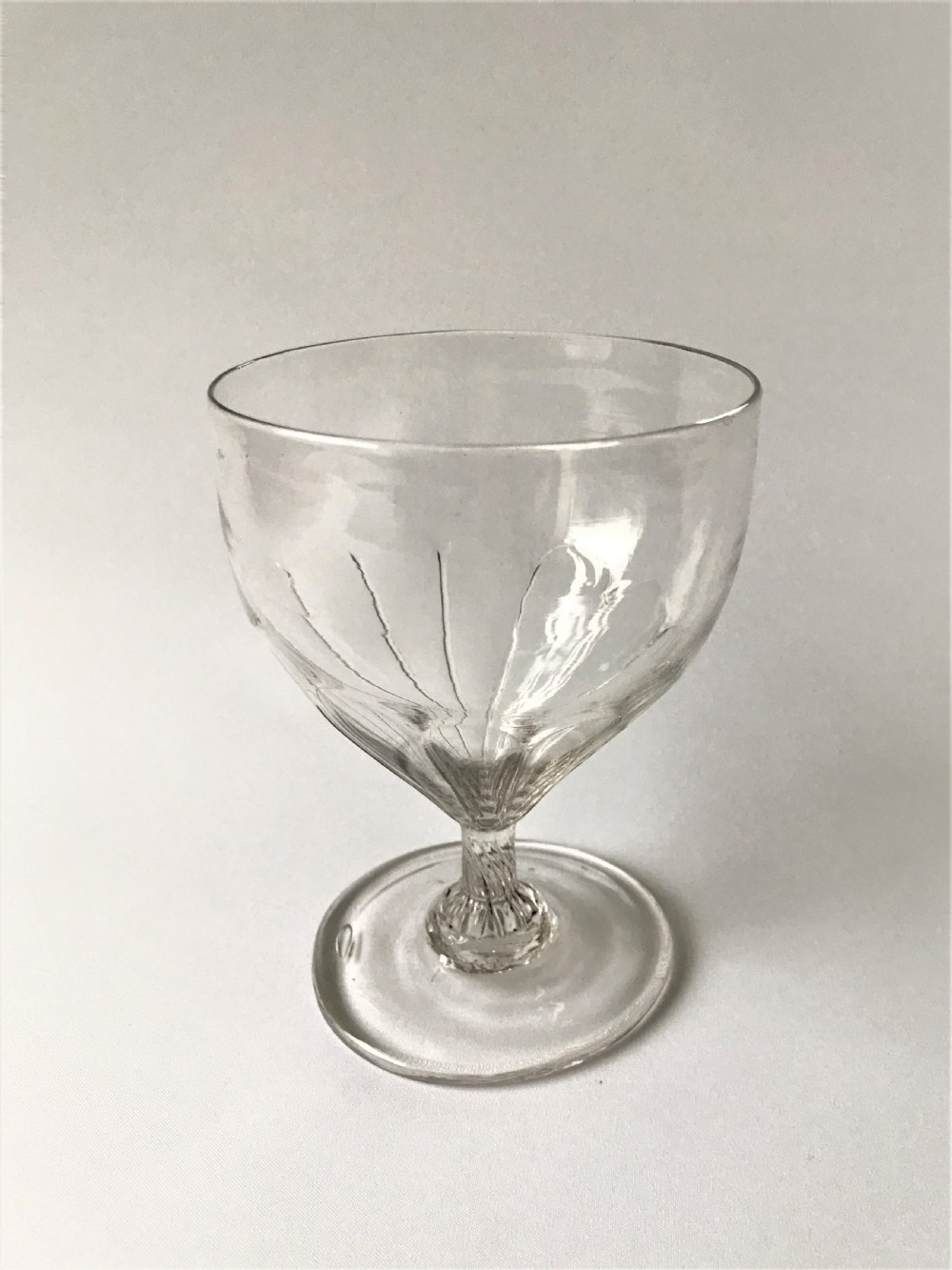 A late 18th Century wrythen glass rummer