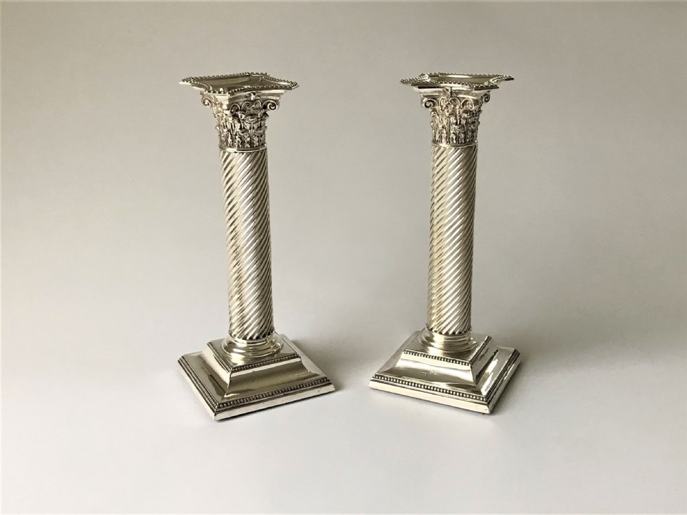 A fabulous pair of Victorian silver candlesticks