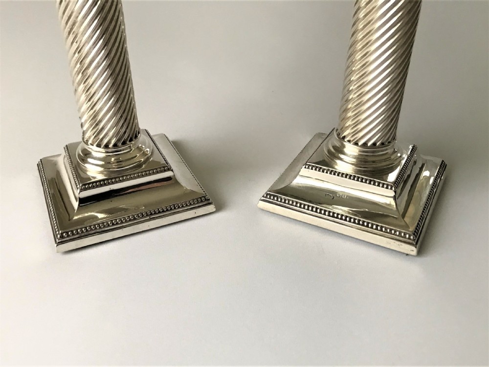 A fabulous pair of Victorian silver candlesticks View II