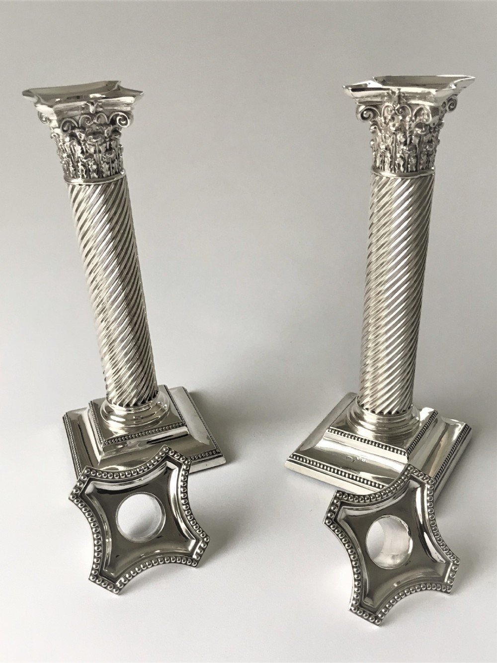 A fabulous pair of Victorian silver candlesticks View IV