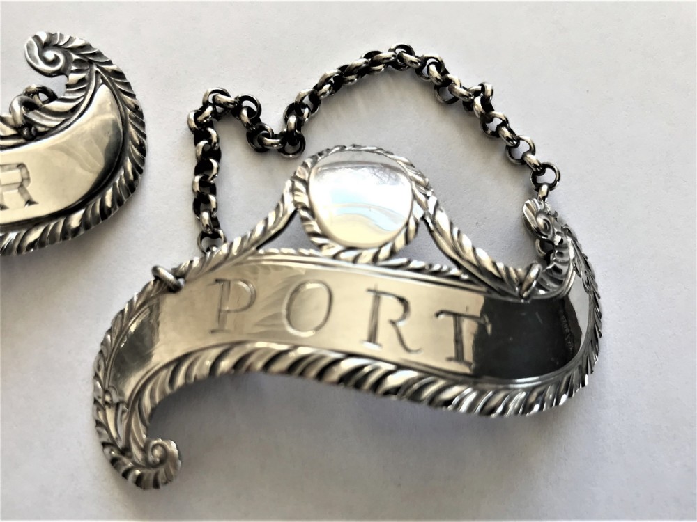 Three rare Hester Bateman silver wine labels View IV