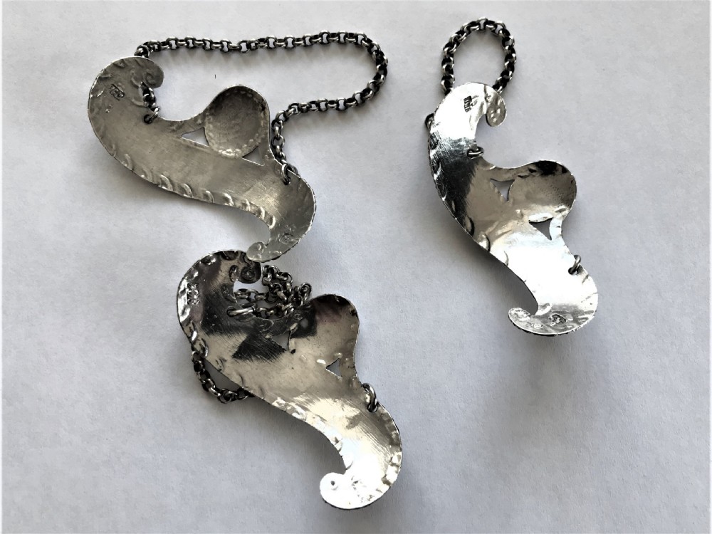 Three rare Hester Bateman silver wine labels View V