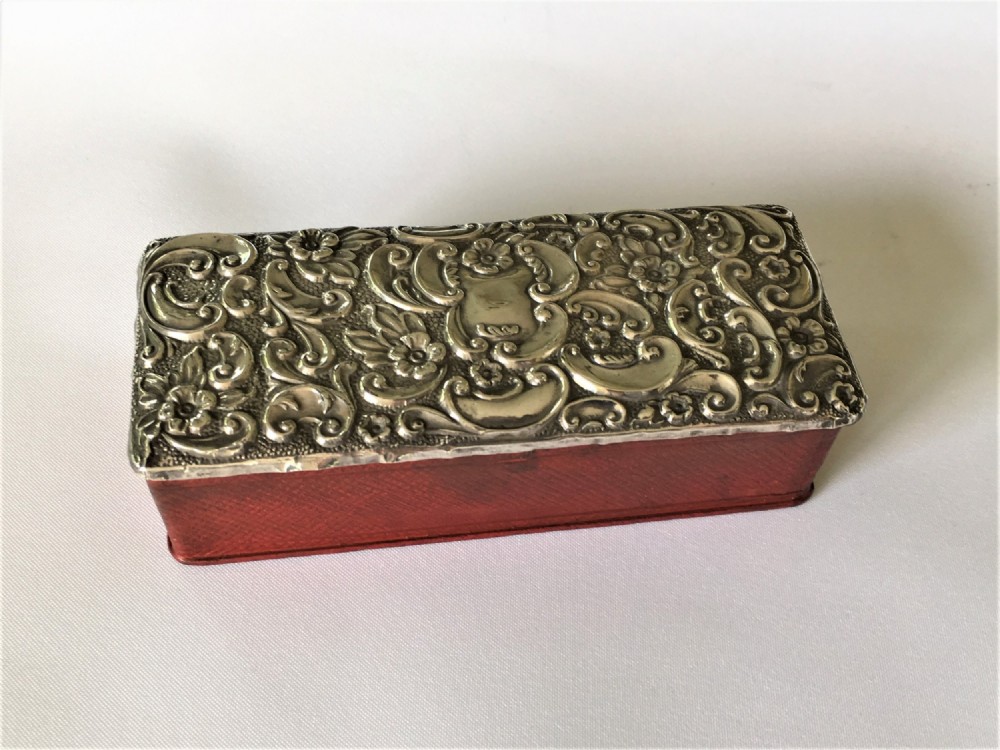 A charming Edwardian silver mounted ring box