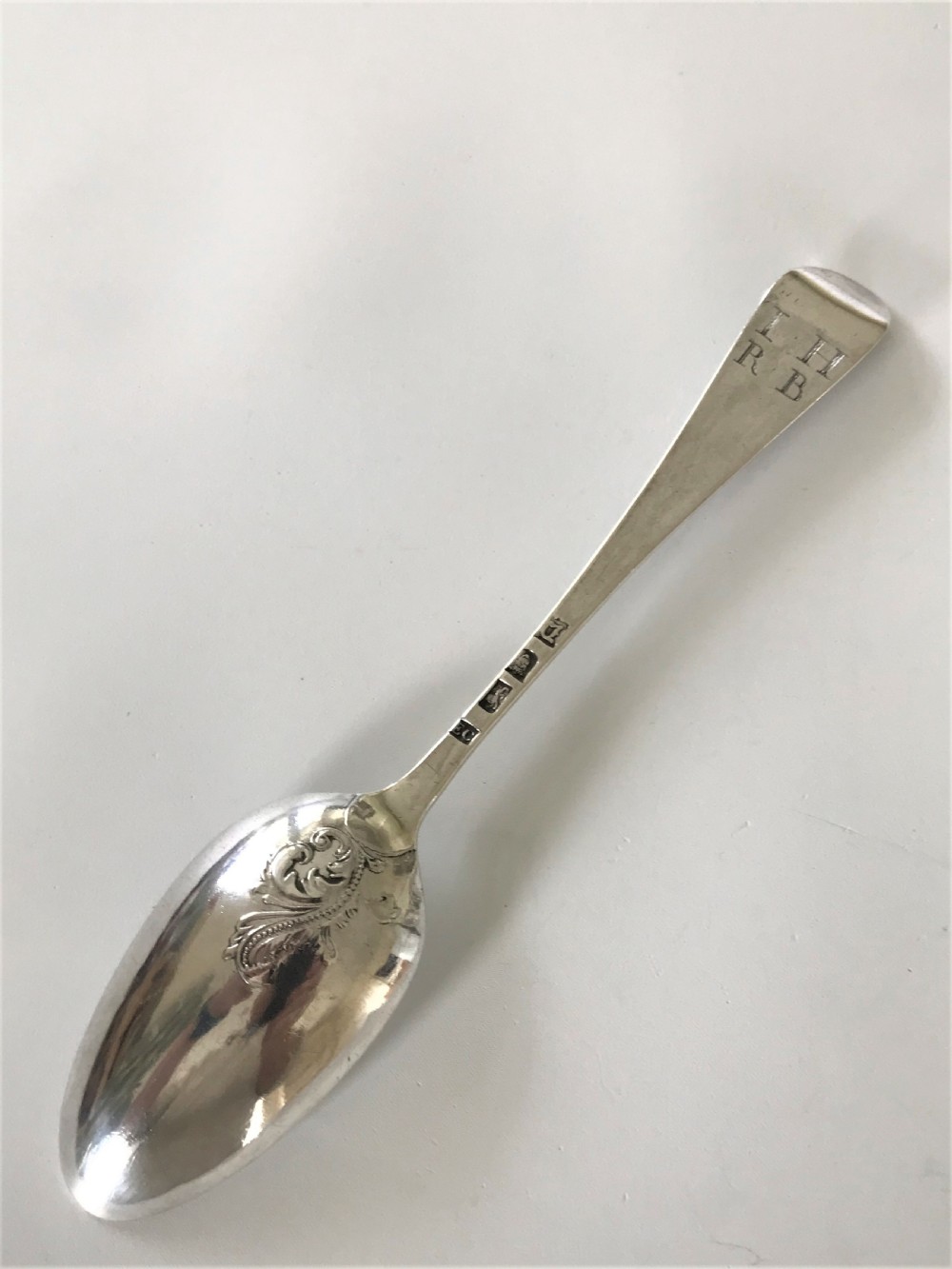 A handsome George II silver fancy back serving spoon View III