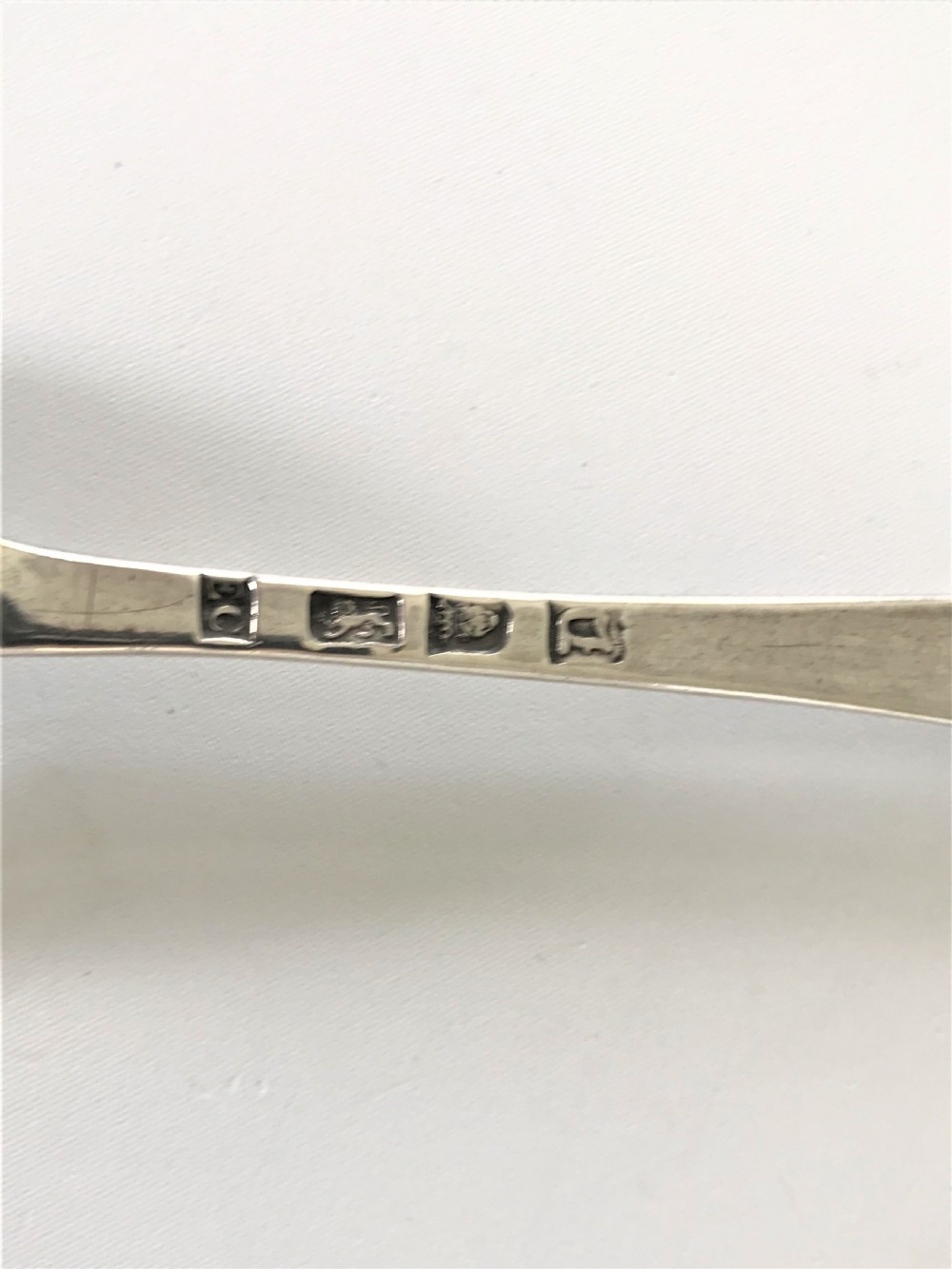 A handsome George II silver fancy back serving spoon View IV