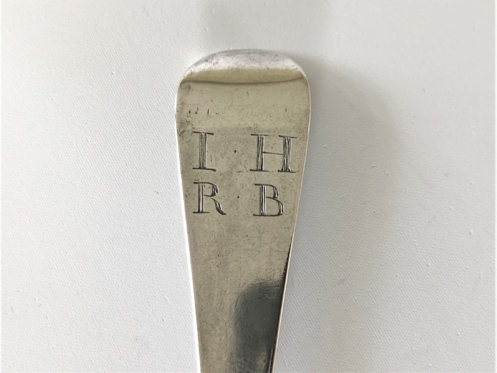 A handsome George II silver fancy back serving spoon View V