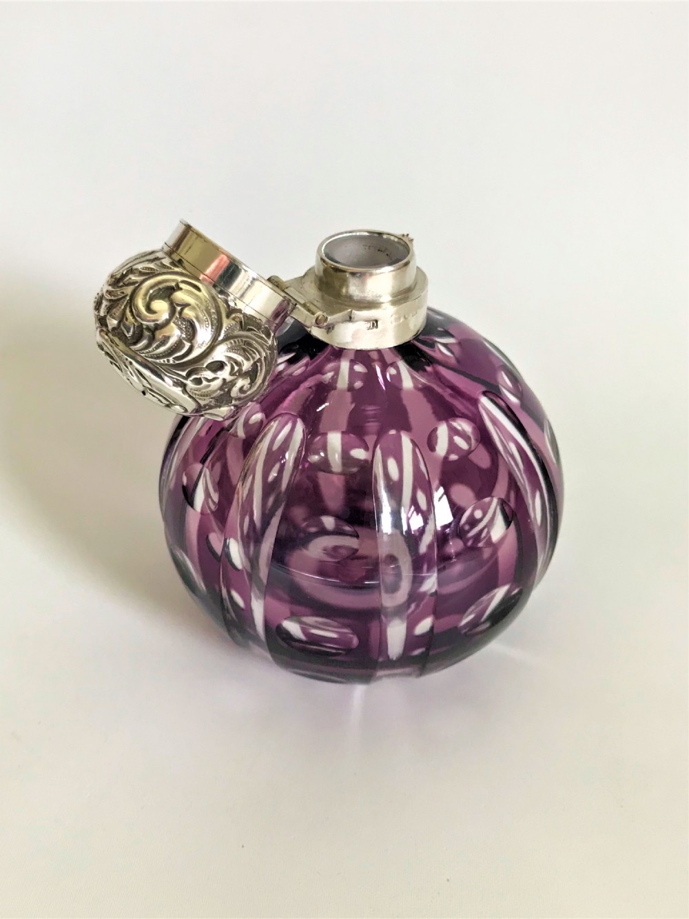 A fabulous Victorian silver & amethyst glass cologne bottle View II
