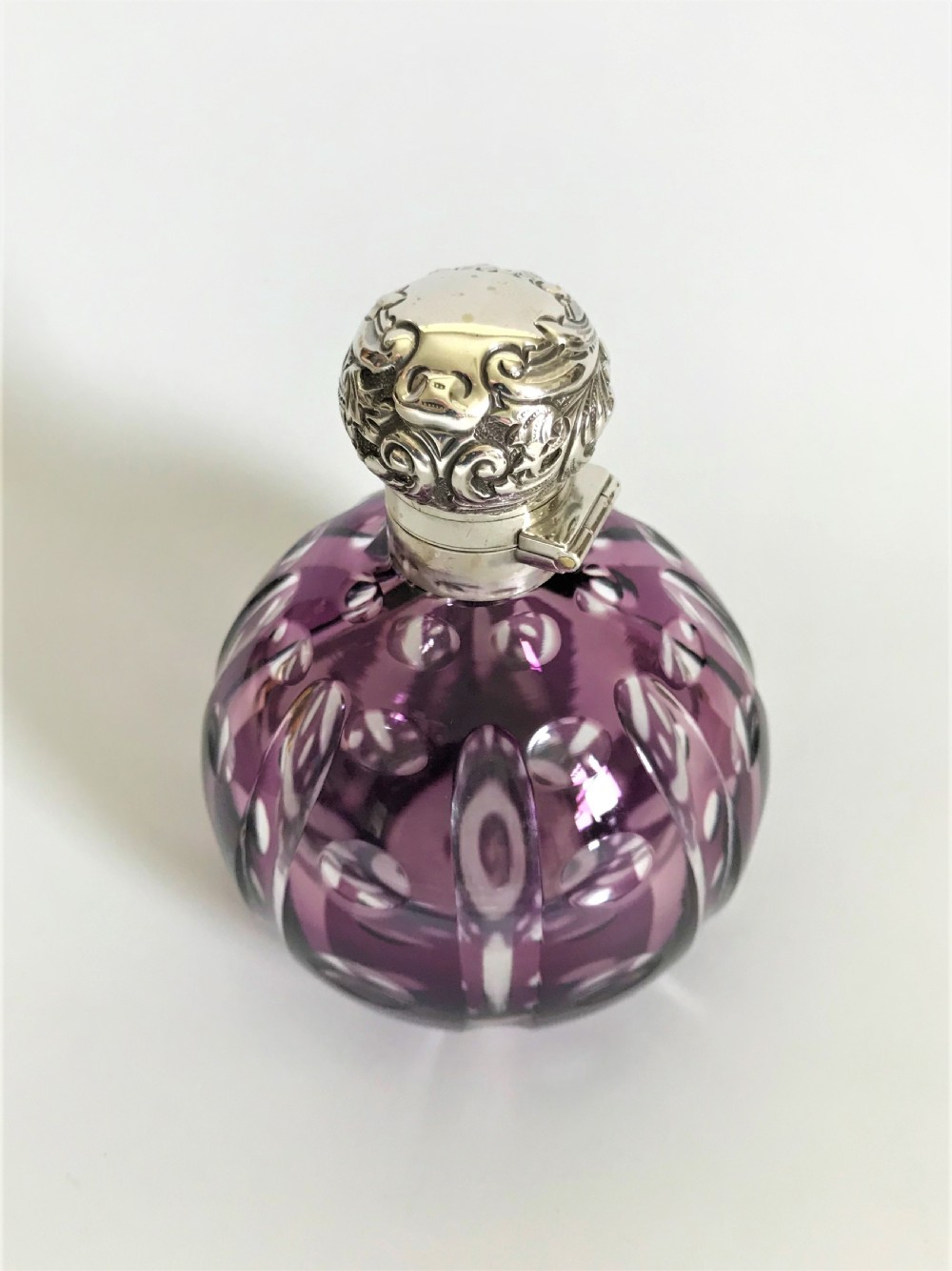 A fabulous Victorian silver & amethyst glass cologne bottle View III
