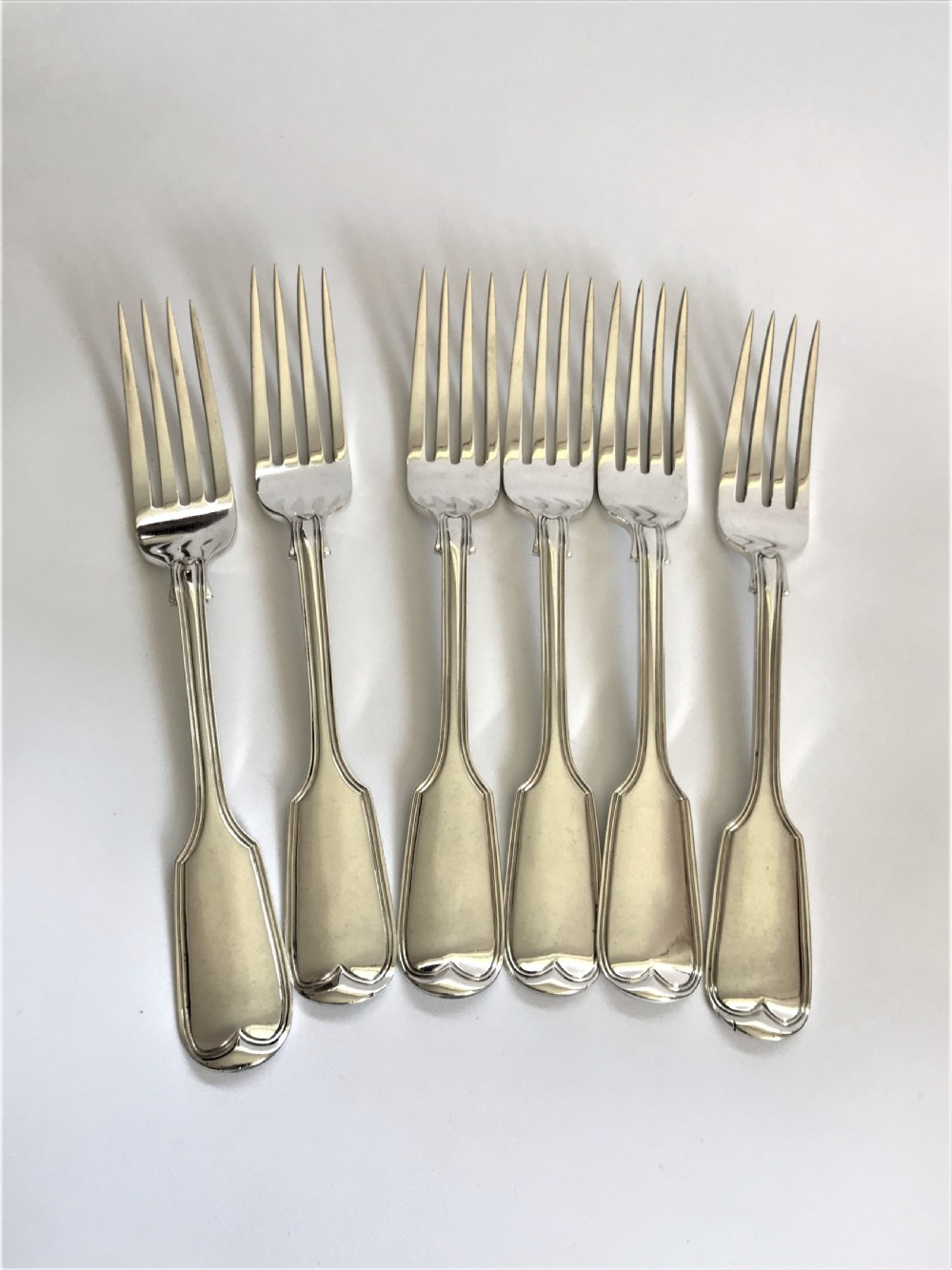 A substantial set of 6 Victorian silver fiddle & thread table forks