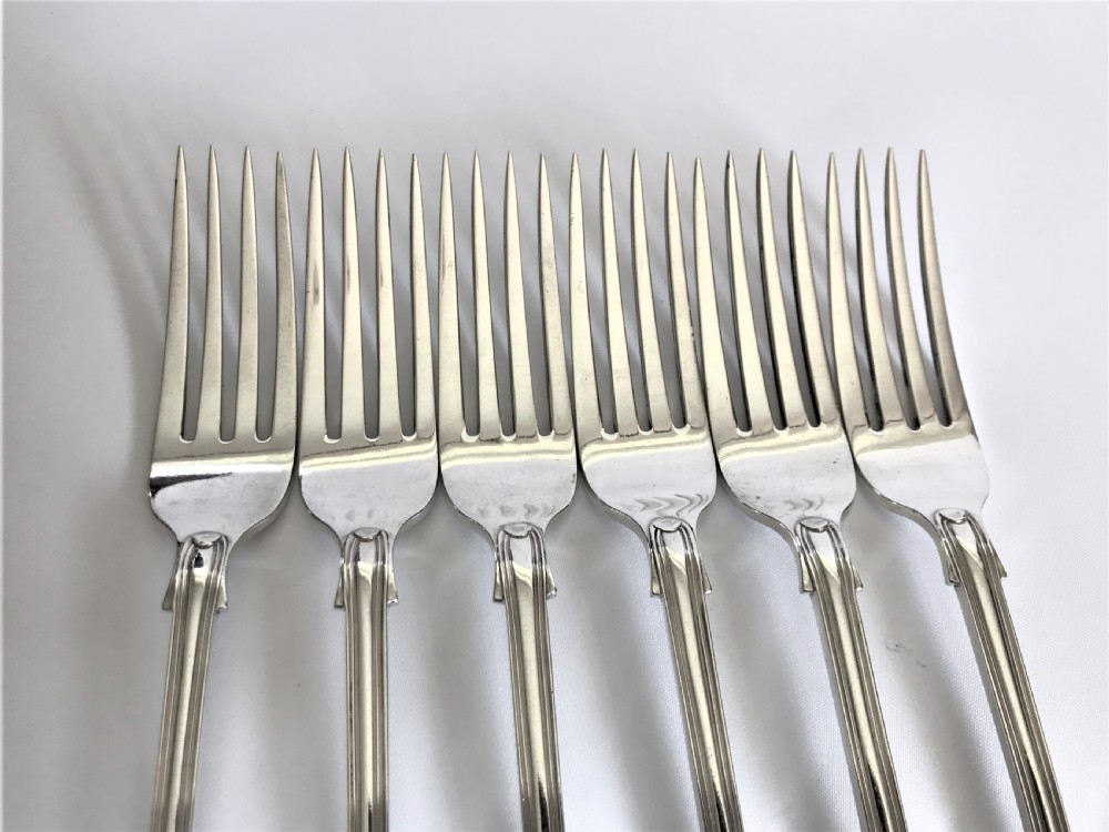 A substantial set of 6 Victorian silver fiddle & thread table forks View II
