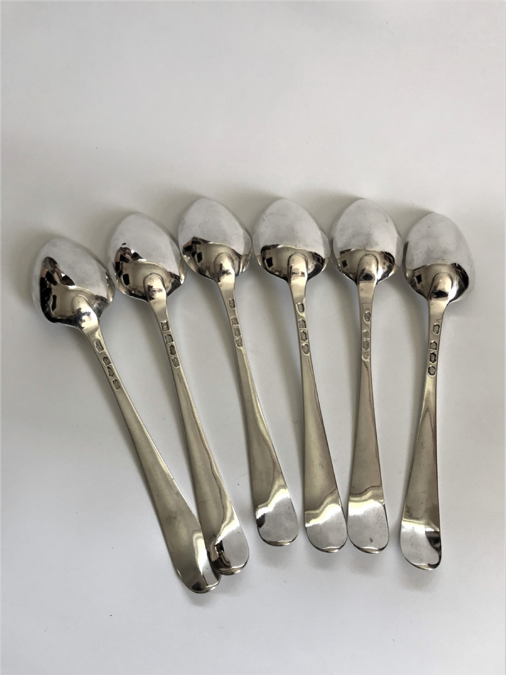 An outstanding set of 6 Irish 18th Century silver serving spoons View II