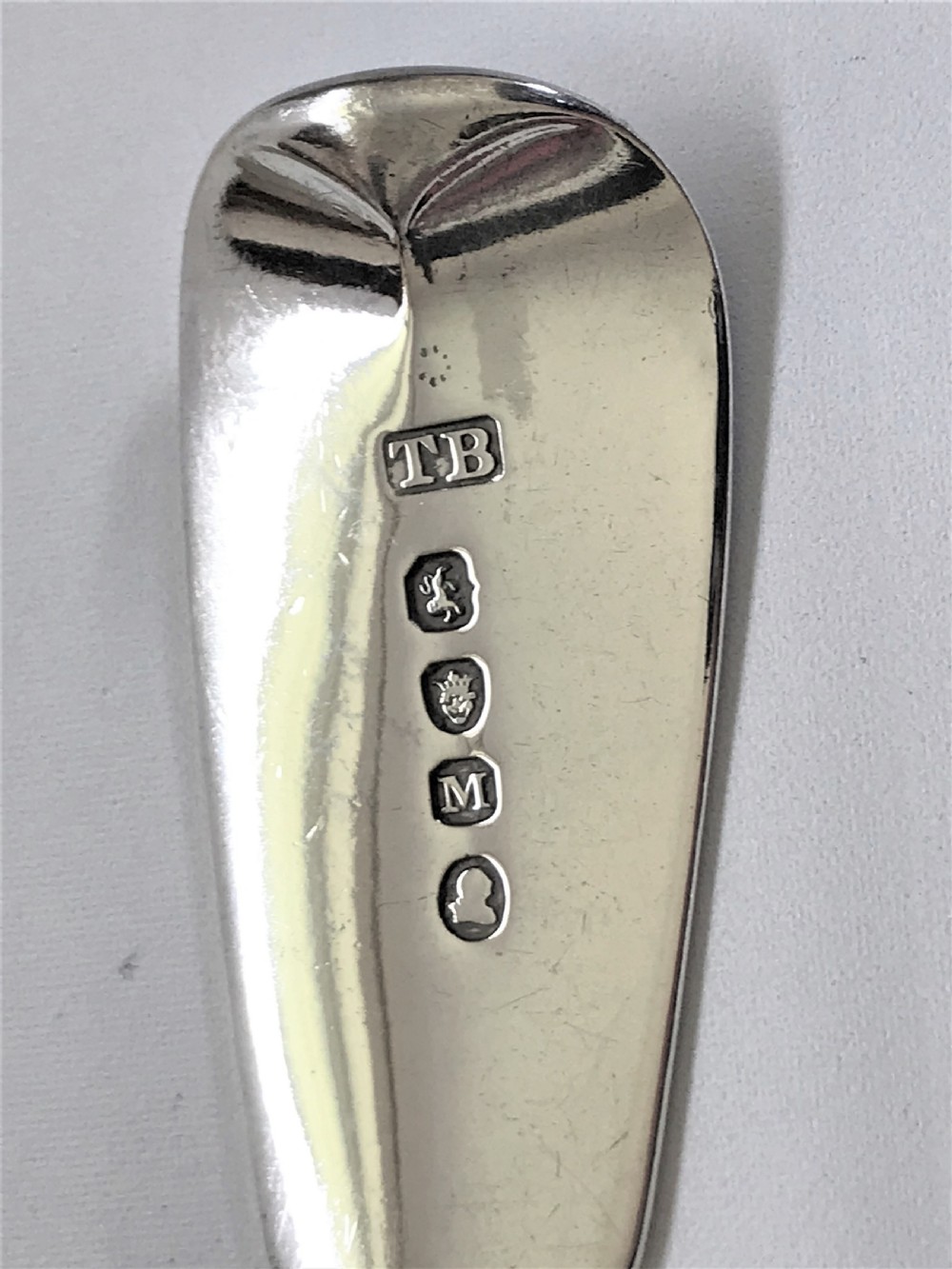 A fine set of 6 Georgian silver table/serving spoons View V