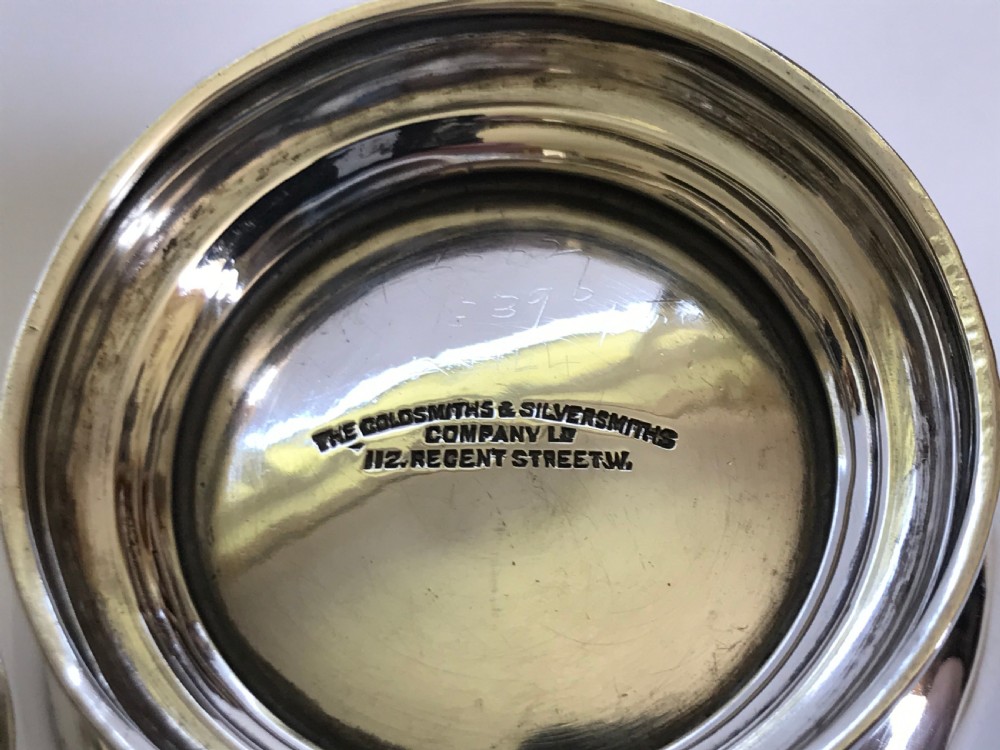 A superb silver tea strainer & drip cup View VI