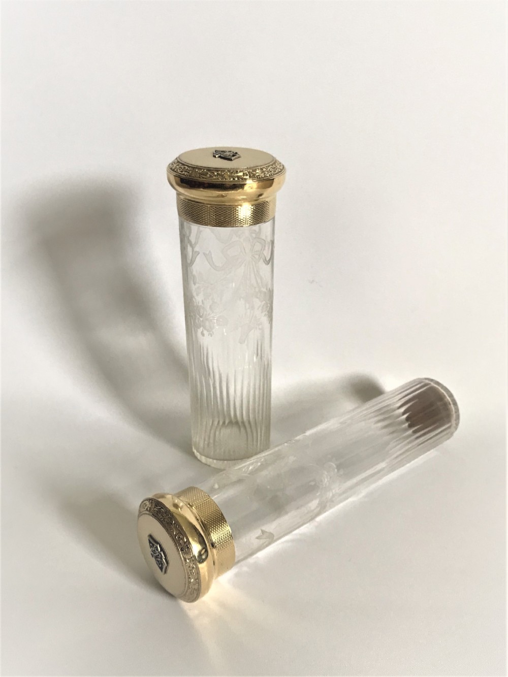 A fabulous pair of silver gilt dressing table jars