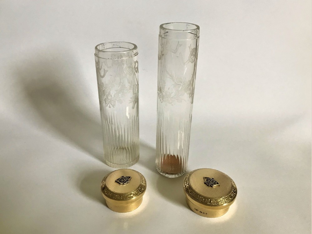 A fabulous pair of silver gilt dressing table jars View V