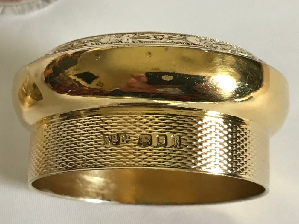 A fabulous pair of silver gilt dressing table jars View VI