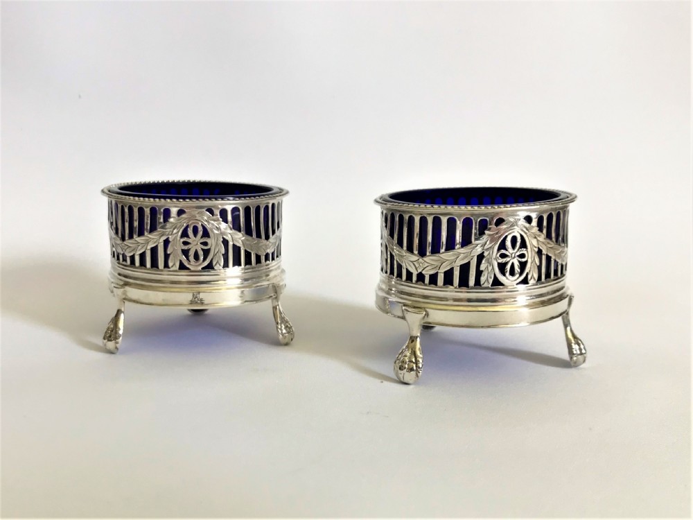 A superb pair of 18th Century silver condiment tubs