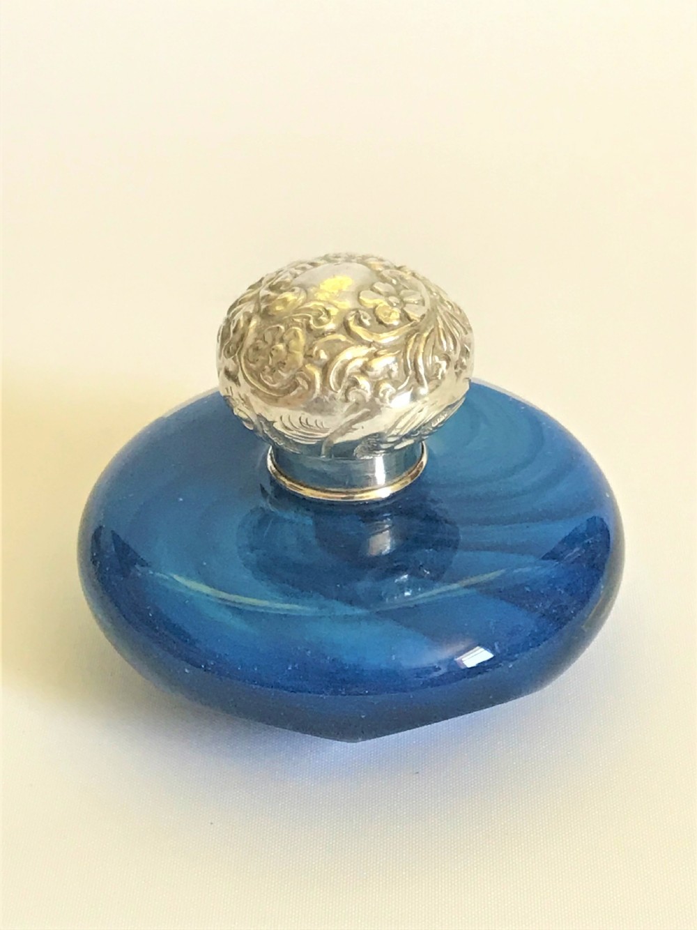 A lovely Victorian silver mounted scent bottle