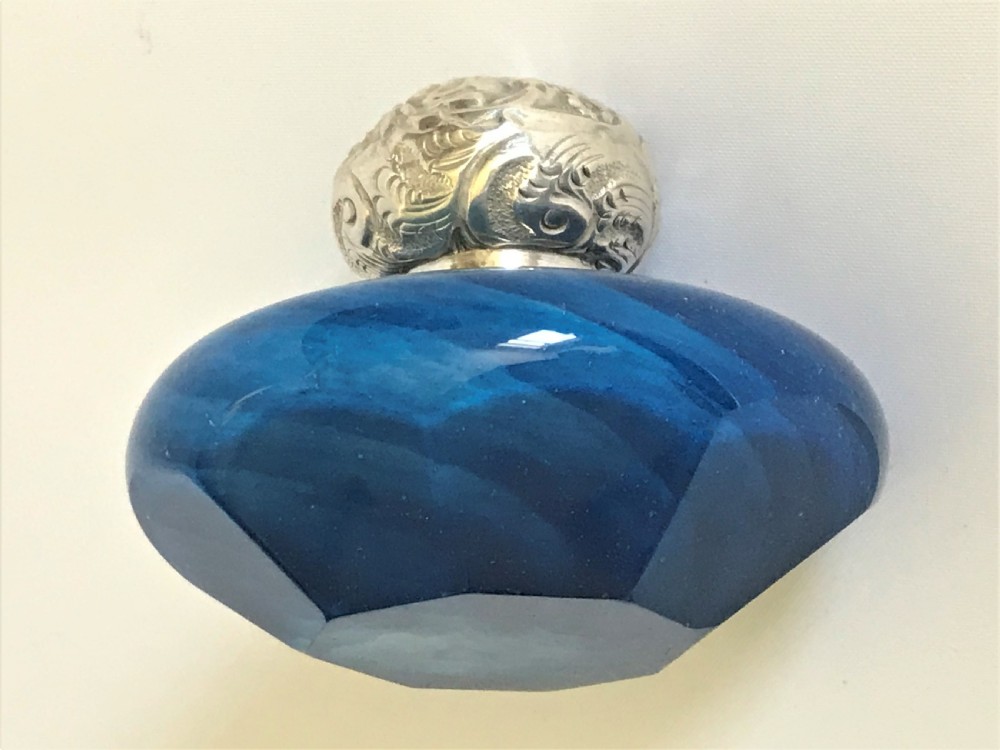 A lovely Victorian silver mounted scent bottle View II