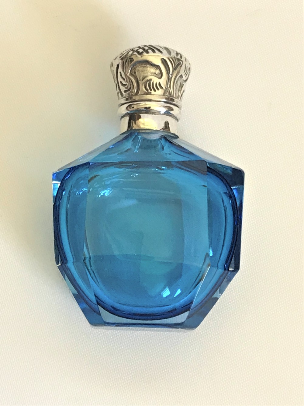 A gorgeous Victorian silver mounted scent bottle