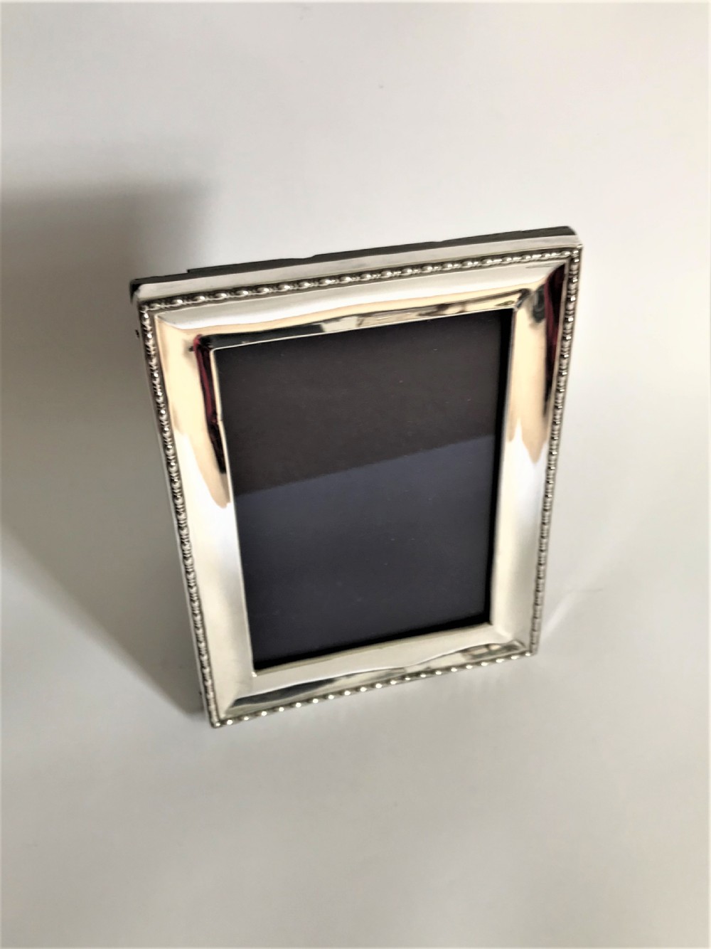 A handsome George V silver photo frame View II