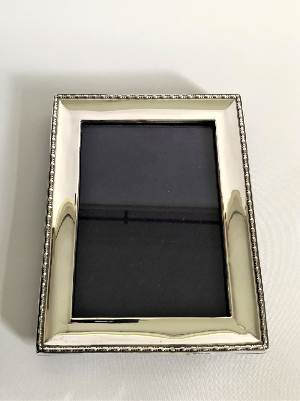 A handsome George V silver photo frame View III