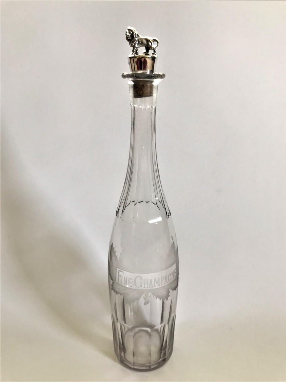 A superb Sterling silver mounted champagne decanter