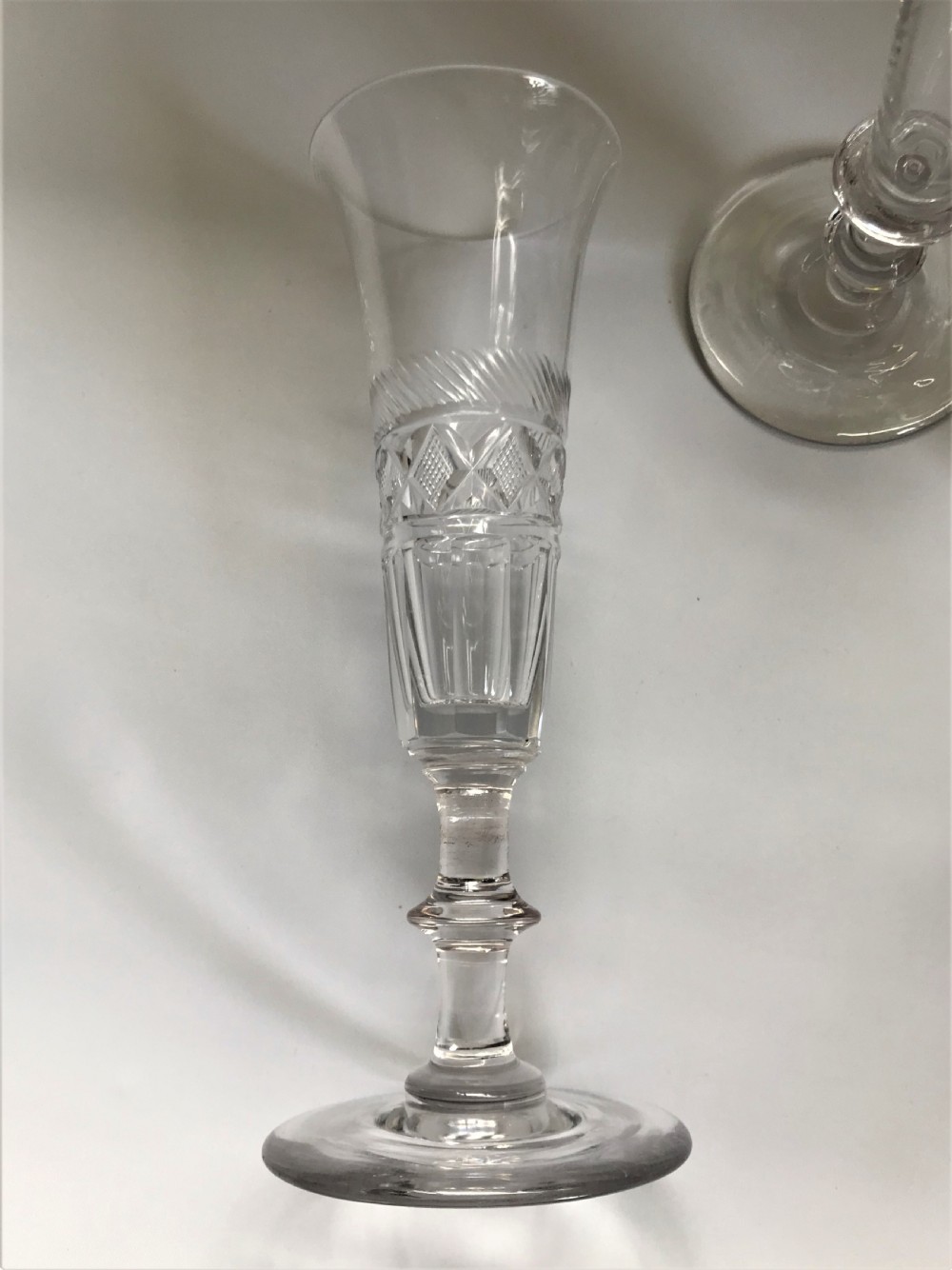 A 19th Century harlequin set of cut champagne flutes View II