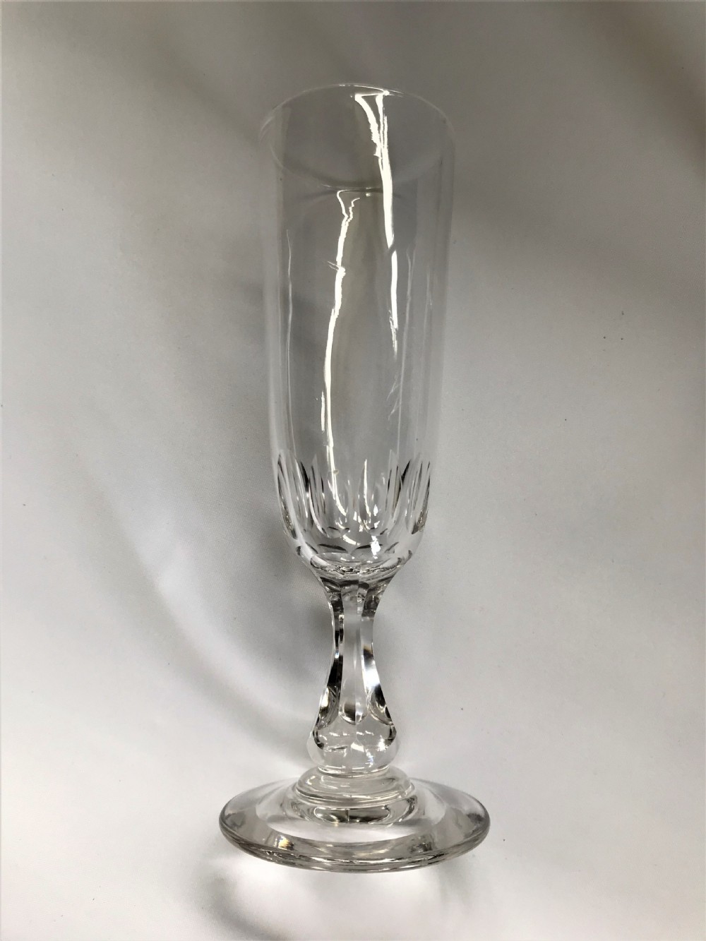 A 19th Century harlequin set of cut champagne flutes View V