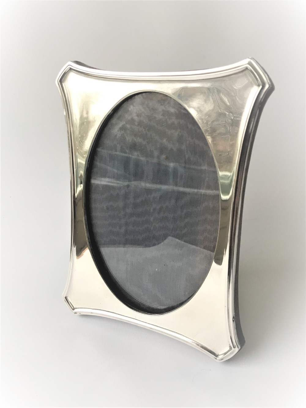 A Stylish & Shaped Silver Photo Frame