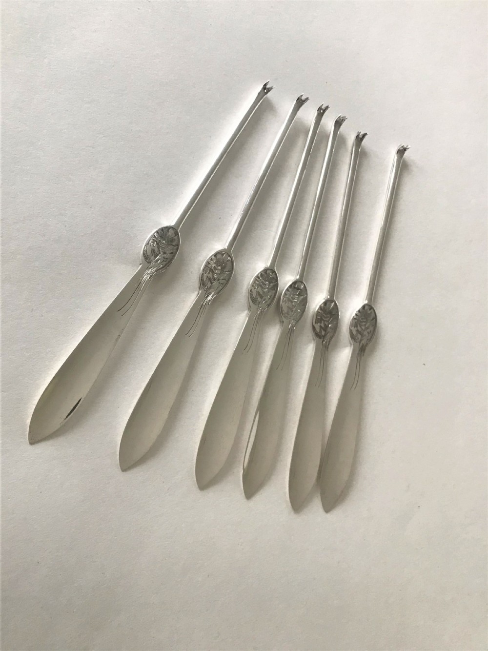 A Rare Set Of Six Hallmarked Silver Lobster Picks
