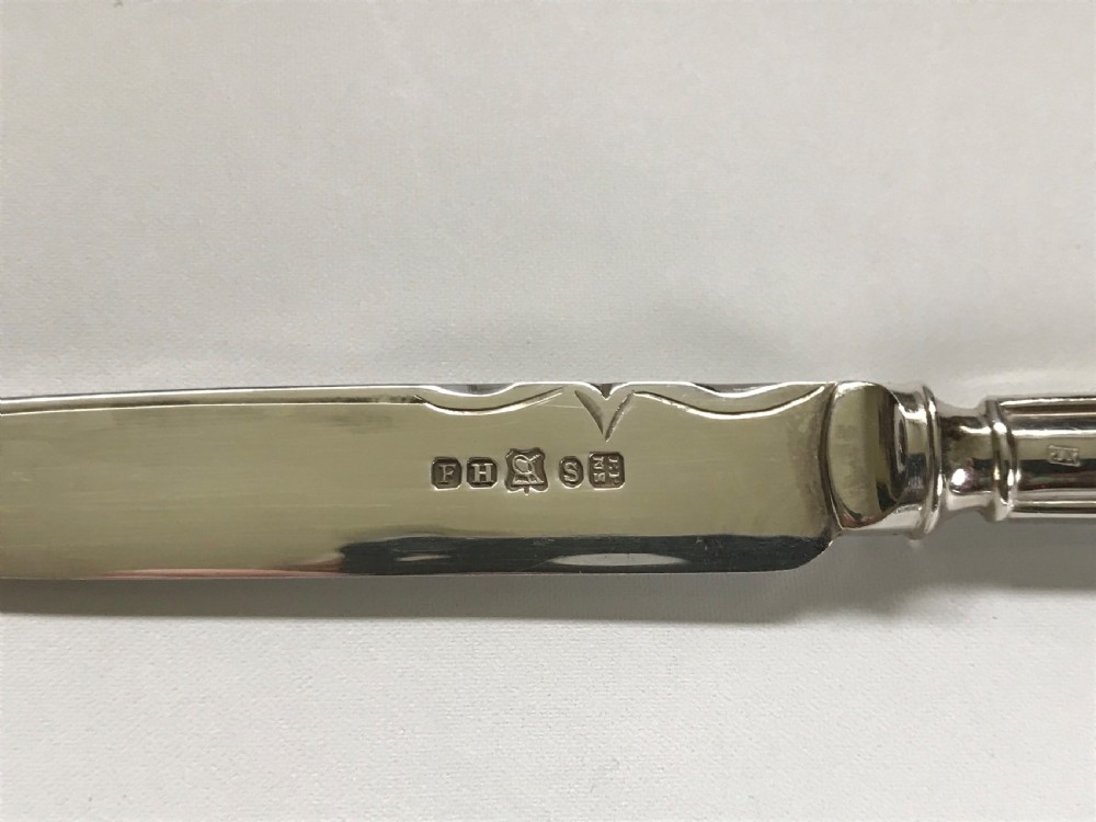 A good set of 6 silver handled tea knives View IV