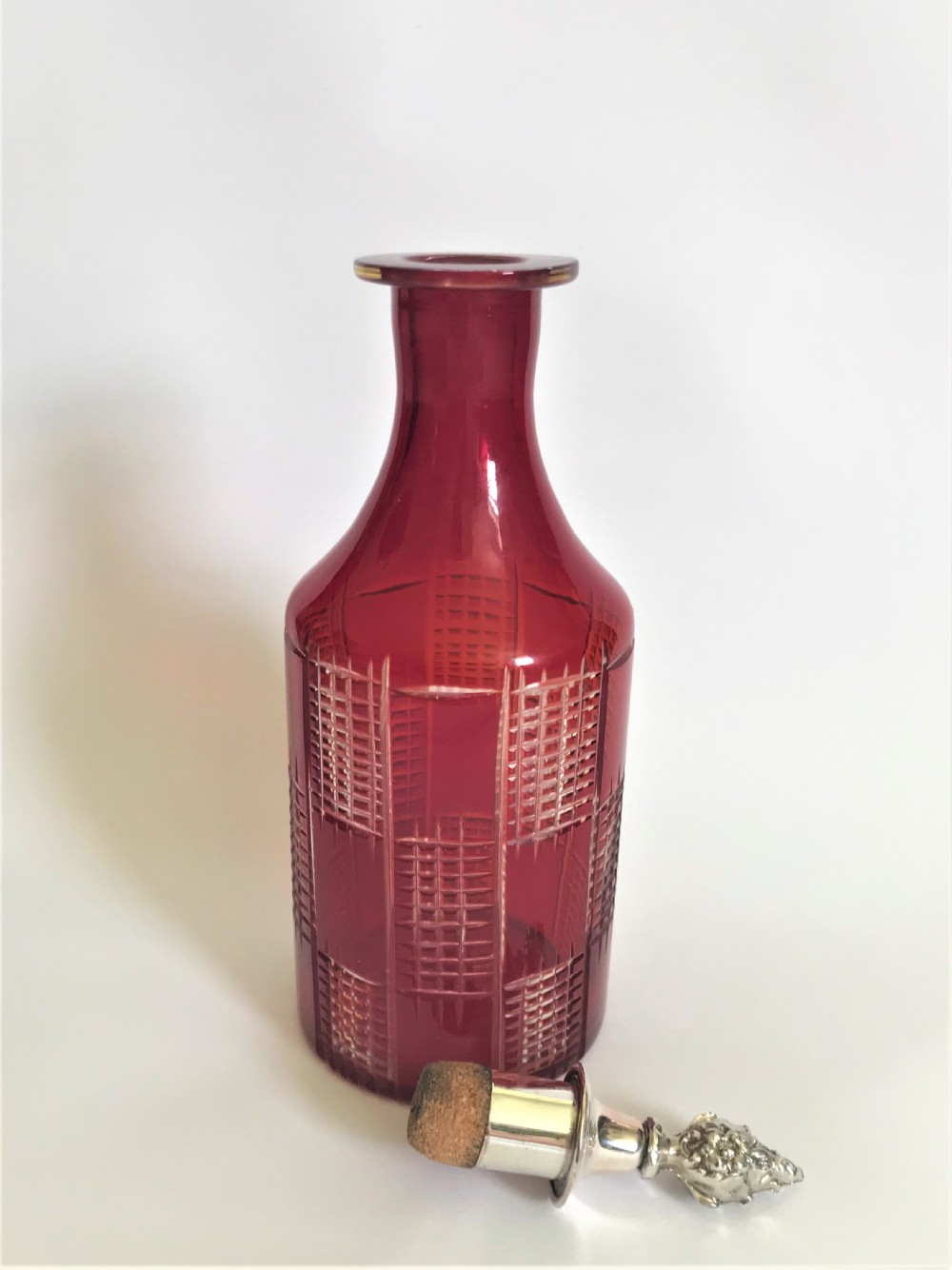 A lovely Ruby glass and silver plate wine bottle View V