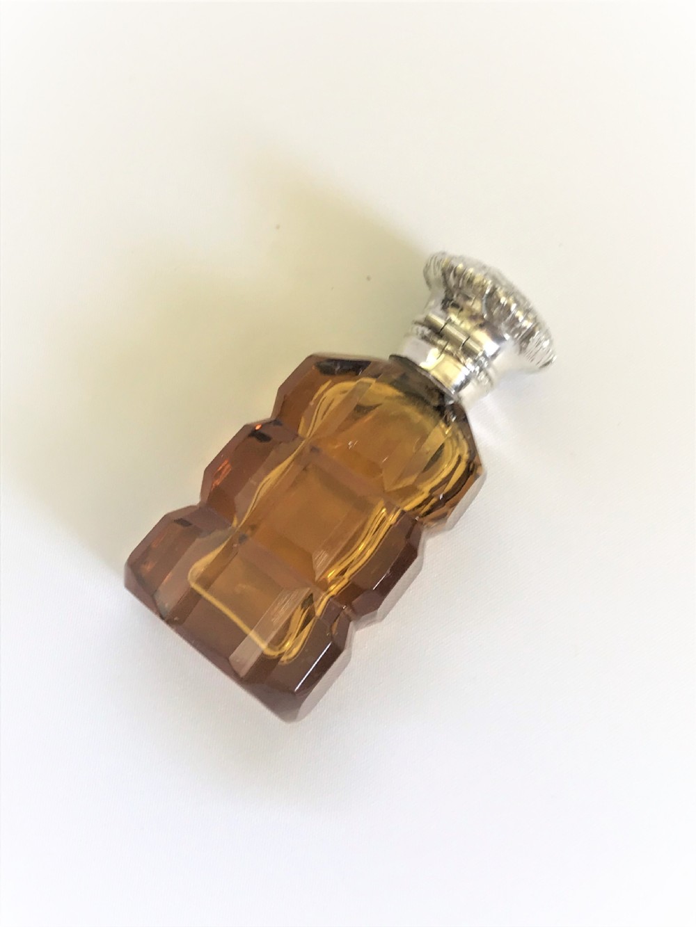 A rare Victorian silver mounted amber scent bottle View VII