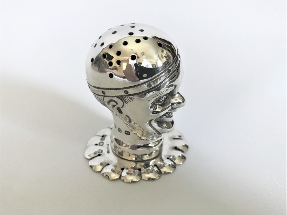 An extraordinary Victorian silver novelty clown pepper pot  View IV