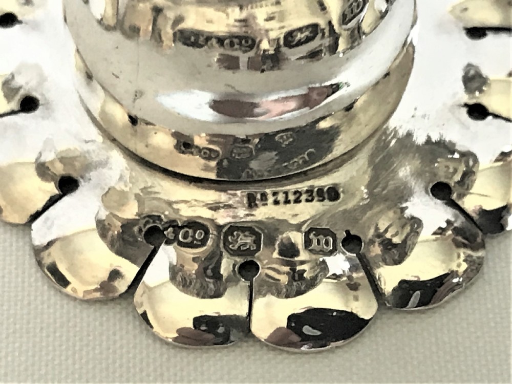 An extraordinary Victorian silver novelty clown pepper pot  View V