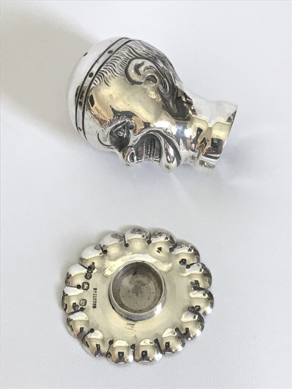 An extraordinary Victorian silver novelty clown pepper pot  View VI