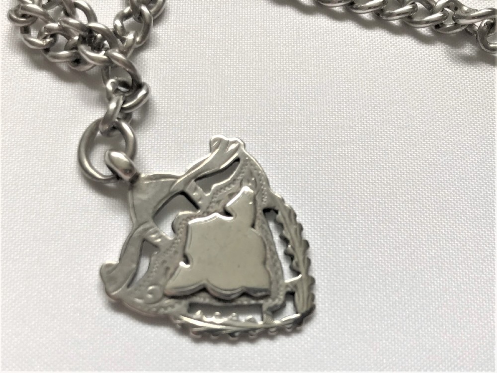 A quality double silver Albert watch chain & fob View III