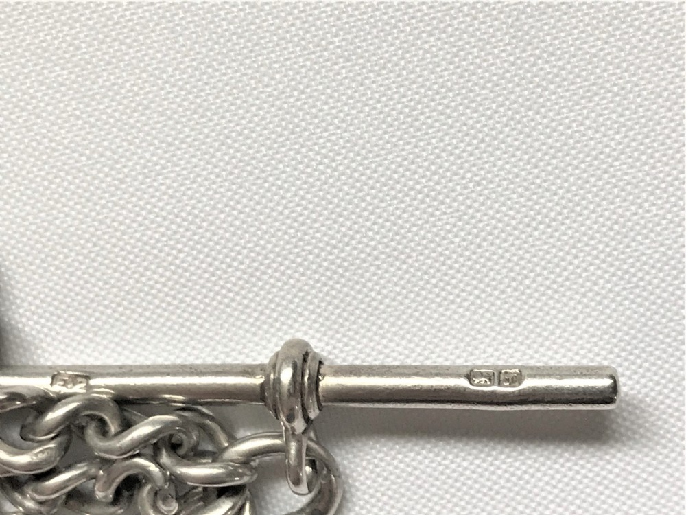 A quality double silver Albert watch chain & fob View VI