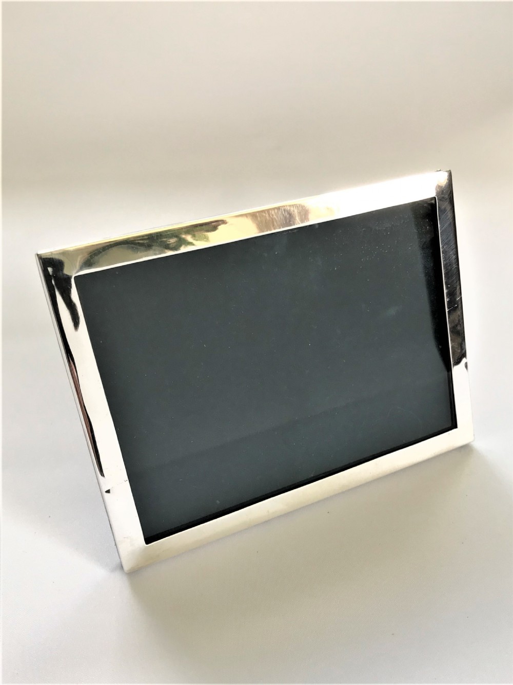 A small silver landscape format photo frame