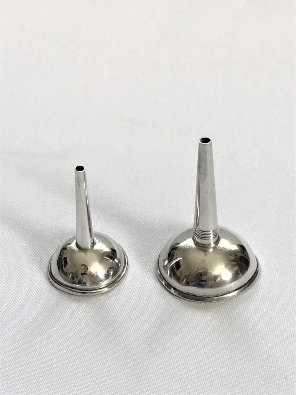 Two Georgian silver perfume funnels View II