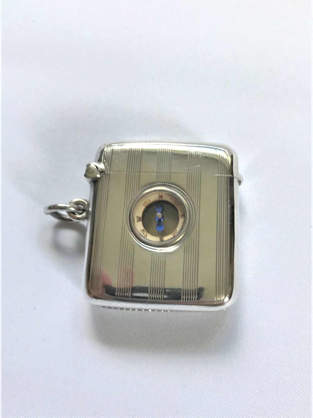 A rare silver vesta & compass combo