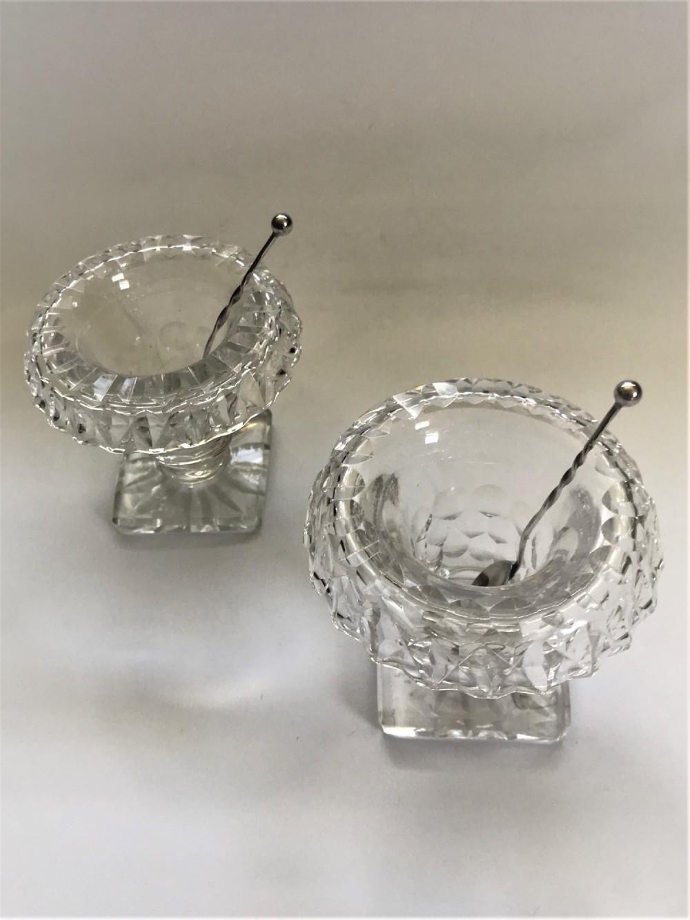 A pair of cut glass Victorian condiment bowls with silver spoons View III