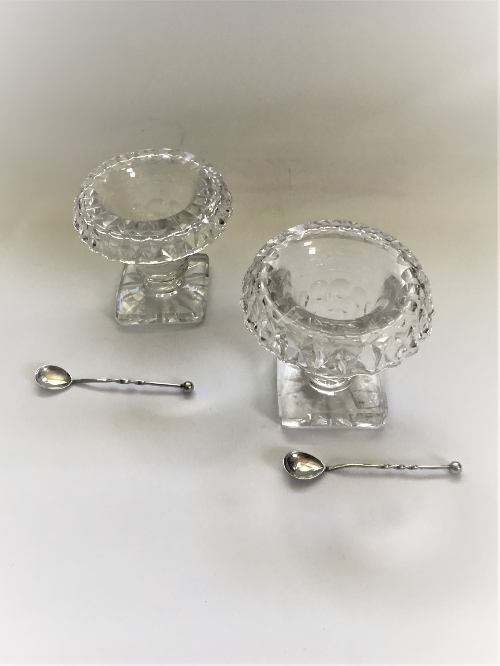 A pair of cut glass Victorian condiment bowls with silver spoons View IV