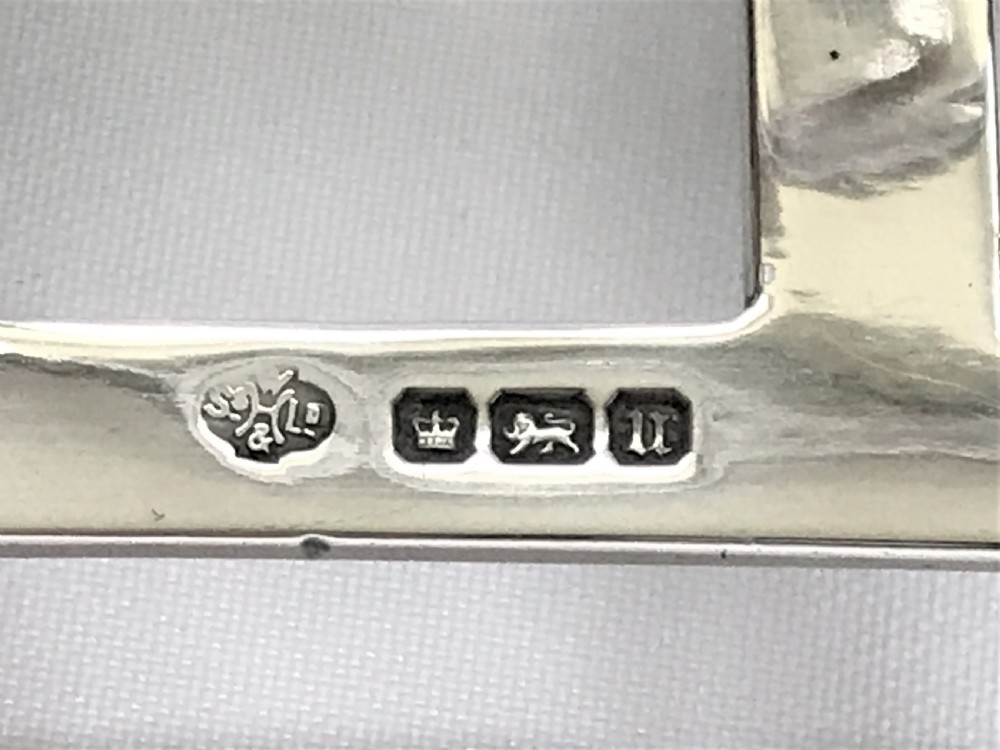 A charming four slice silver toast rack View V