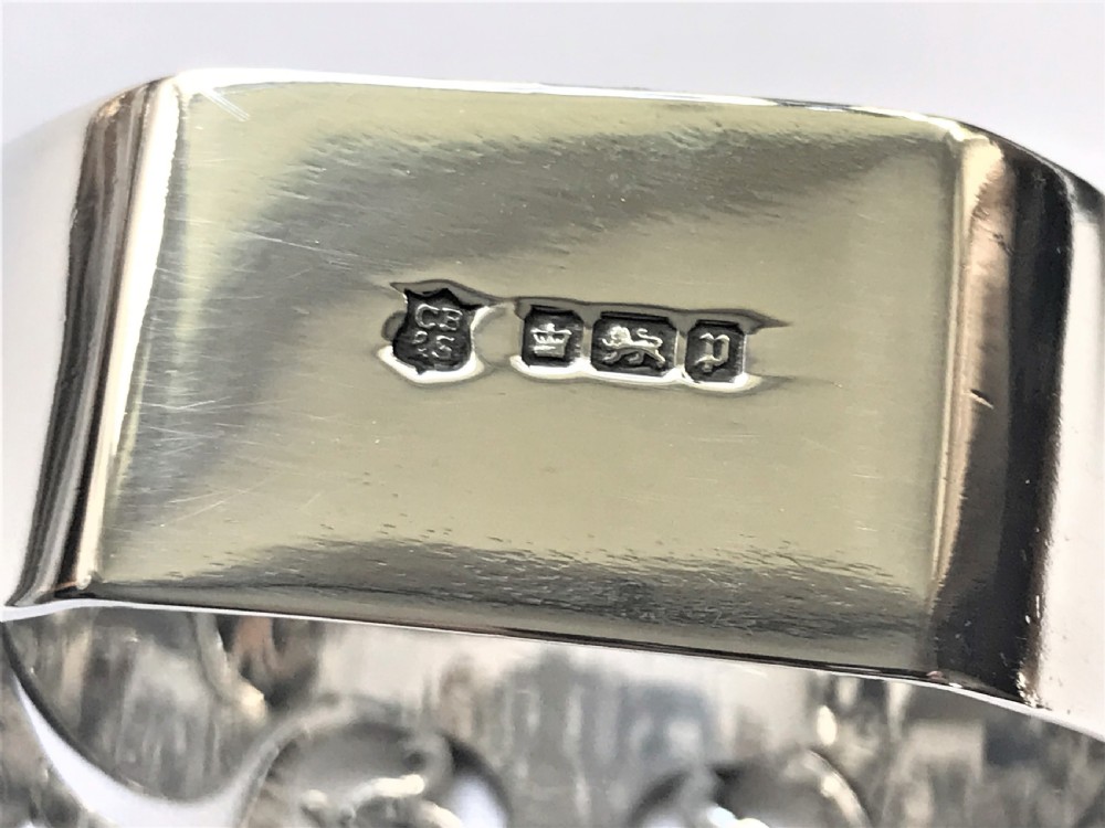 A fabulous Edwardian boxed silver napkin ring View VIII