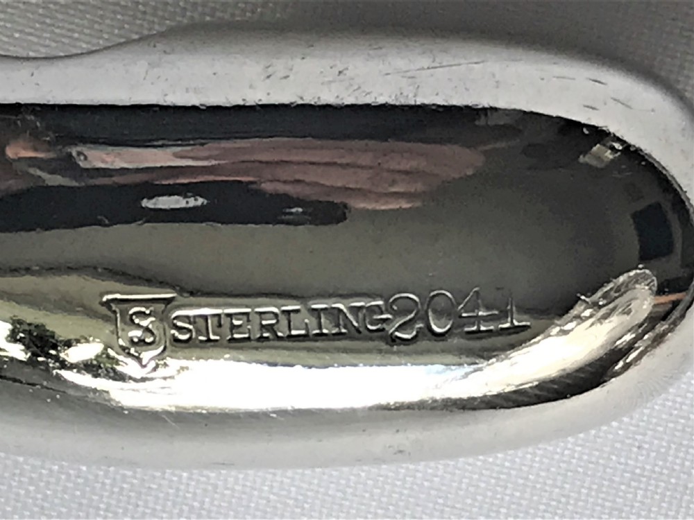 A rare Sterling silver spice sifting scoop View V